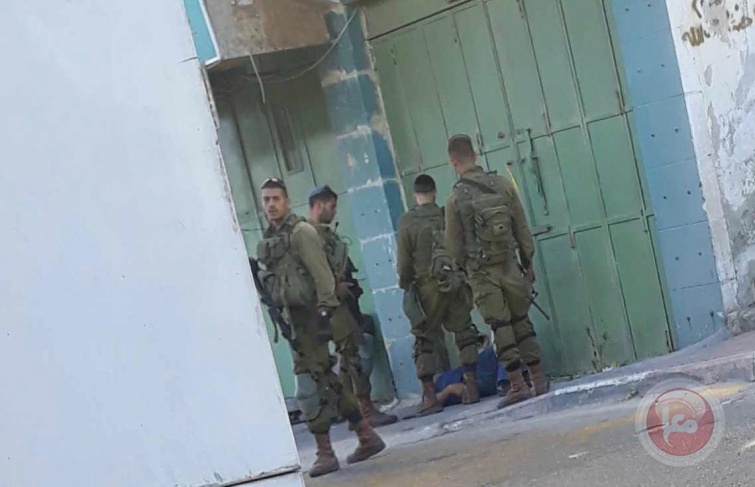 The occupation army beats a citizen in Hebron