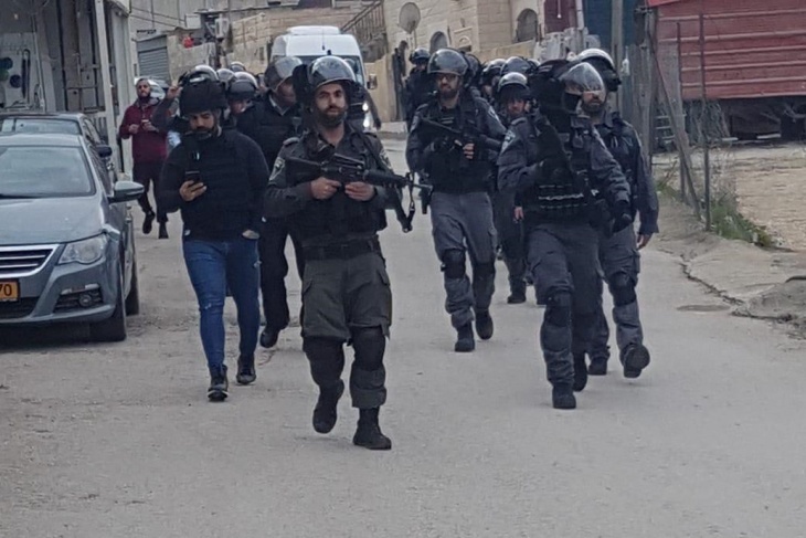 Occupation forces arrest a woman and two young men from Shuafat camp